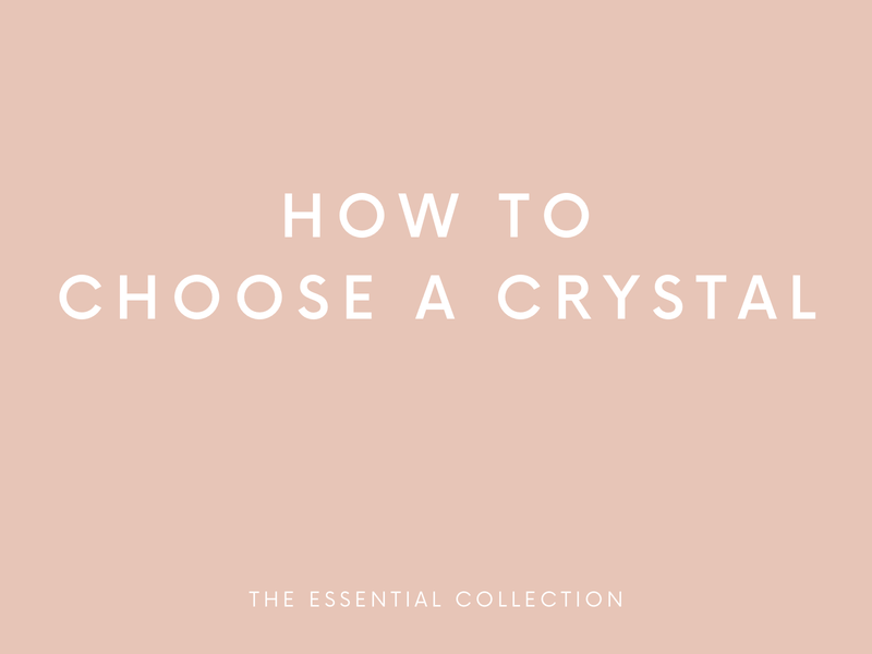 crystal geode on stack of books in home decor