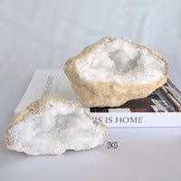 crystal geode pair on book