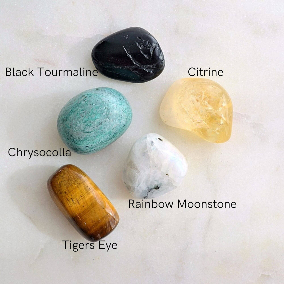 gemini star sign crystals black tourmaline chrysocolla citrine tigers eye rainbow moonstone