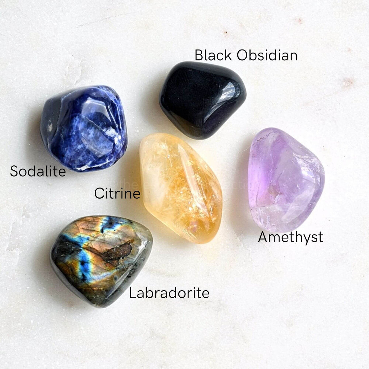 sagittarius star sign crystals sodalite labradorite citrine amethyst black obsidian