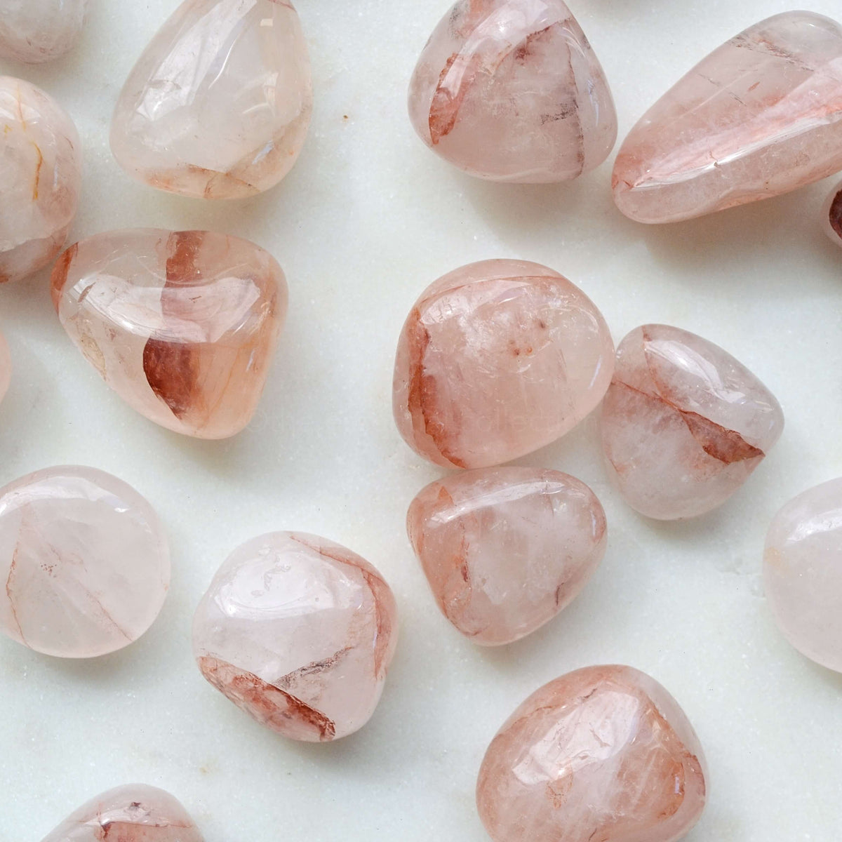 fire quartz also known as hematoid quartz tumbled crystals