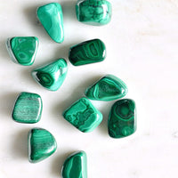 minimalist image of crystals malachite white background