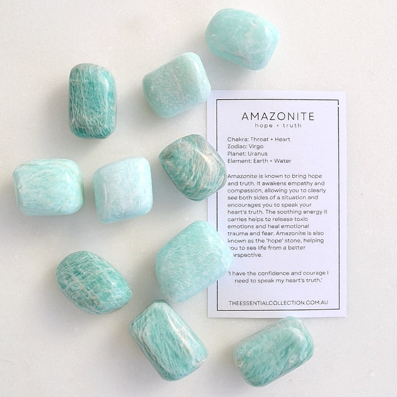 amazonite tumbled crystals shown with free crystal meaning downloadable card
