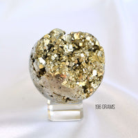 Decorative crystal sphere with gold and gray textures on a white background, labeled '196 Grams'.