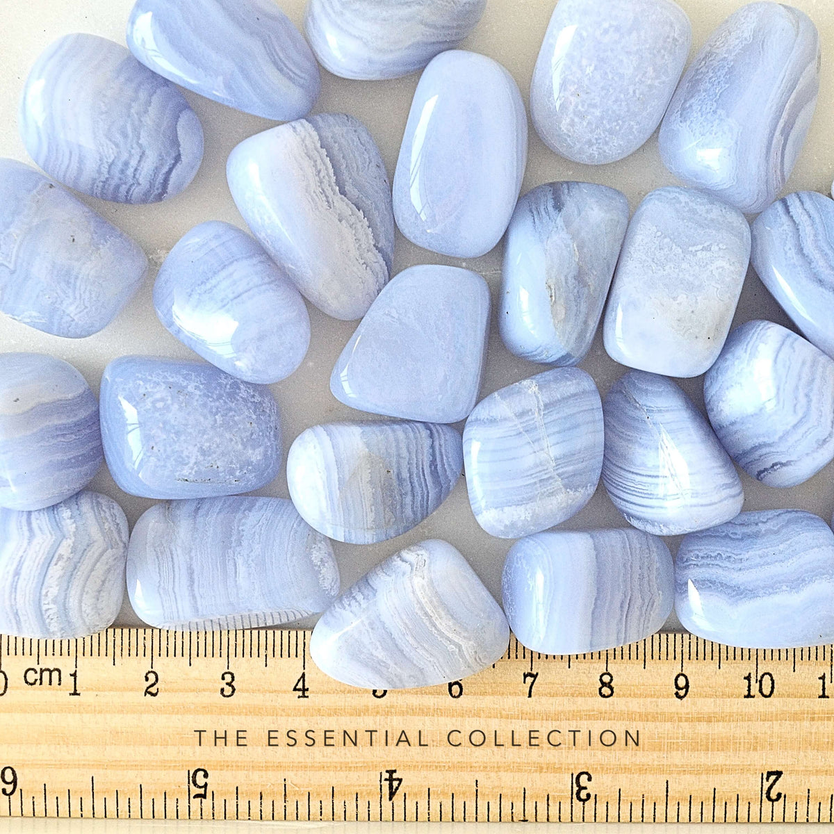close up of blue lace agate crystals with ruler showing size