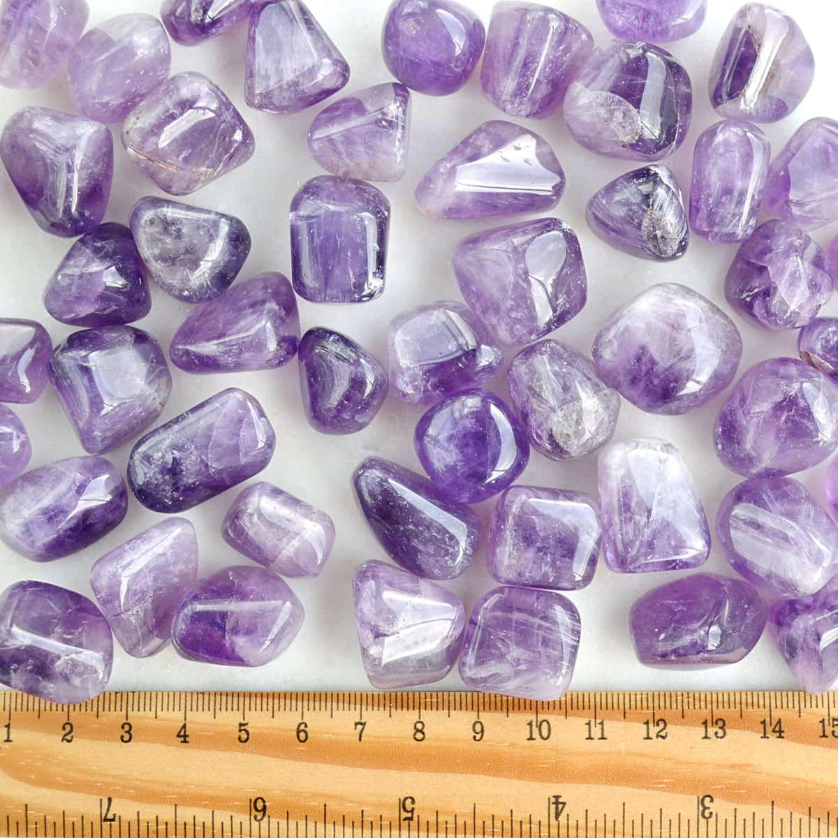 african tumbled crystals with ruler