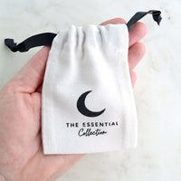 canvas crystal pouch bag in hand
