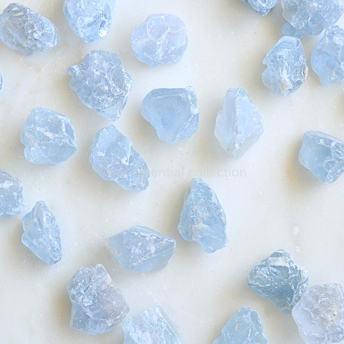 blue Celestite raw crystals white background