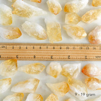baked citrine crystal points with ruler