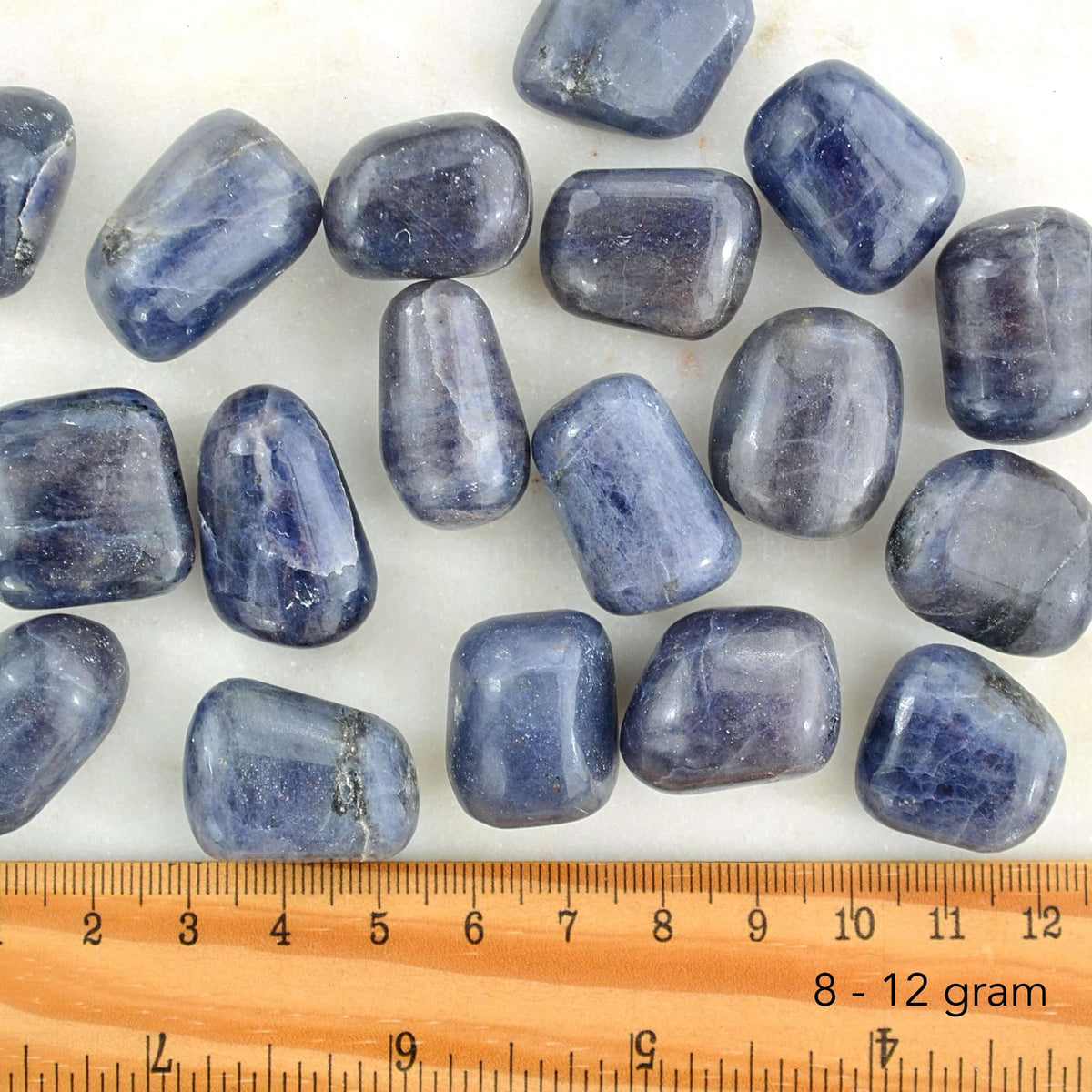 iolite tumbled crystals with ruler