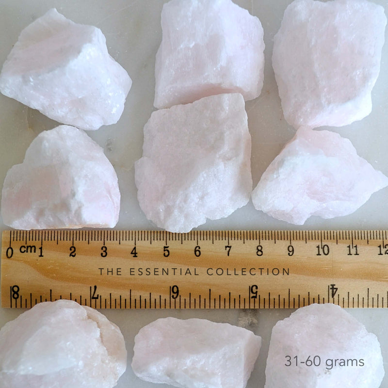 large pink aragonite crystals with ruler