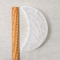 large white selenite crescent moon with ruler