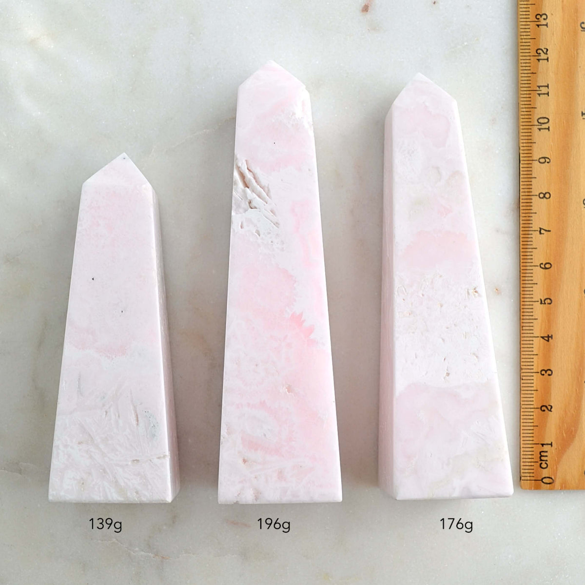 Mangano pink calcite obelisk towers