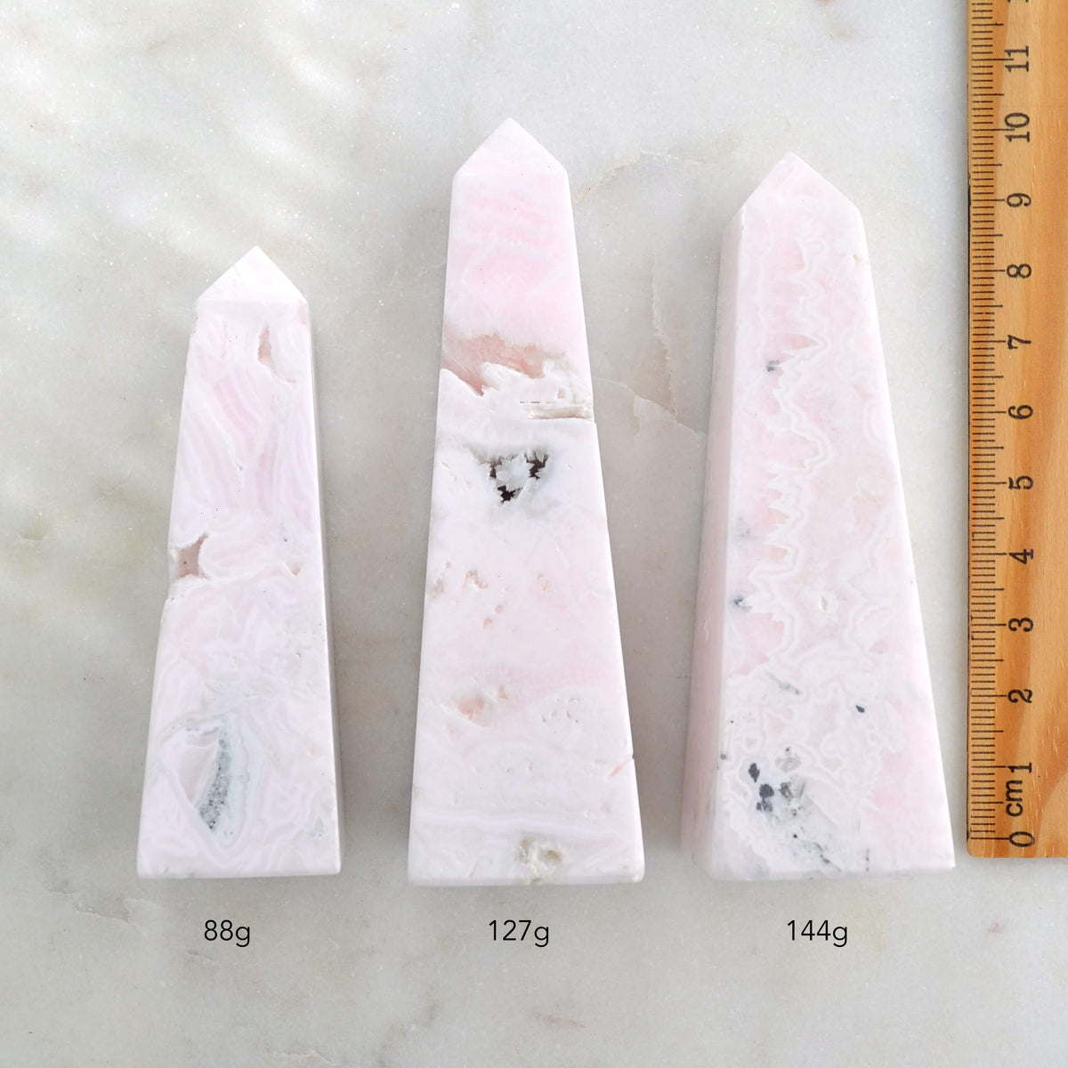 Mangano pink calcite obelisk towers