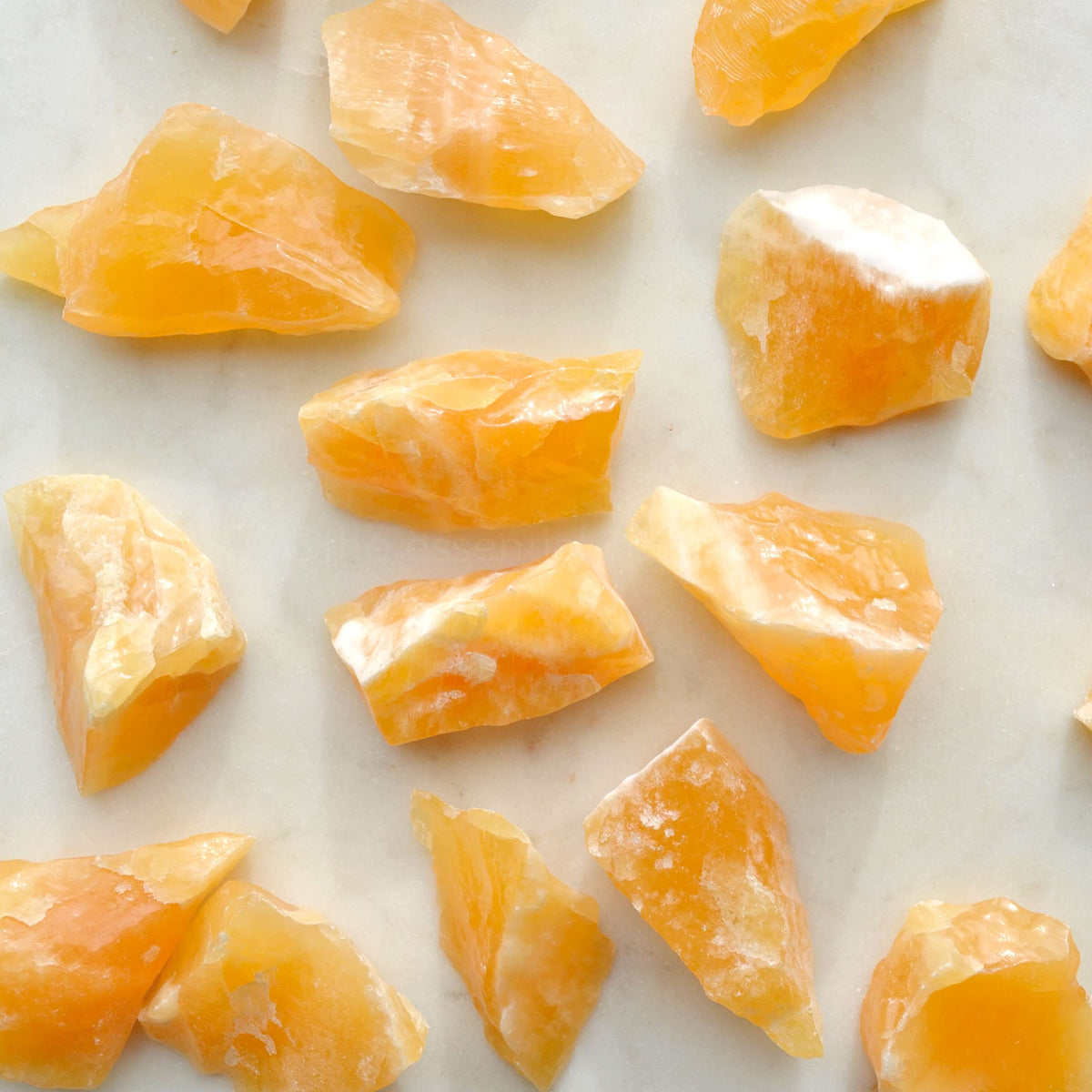 raw rough orange calcite crystals
