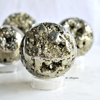 round pyrite sphere by the essential collection crystals