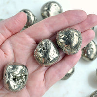 pyrite tumbles in hand