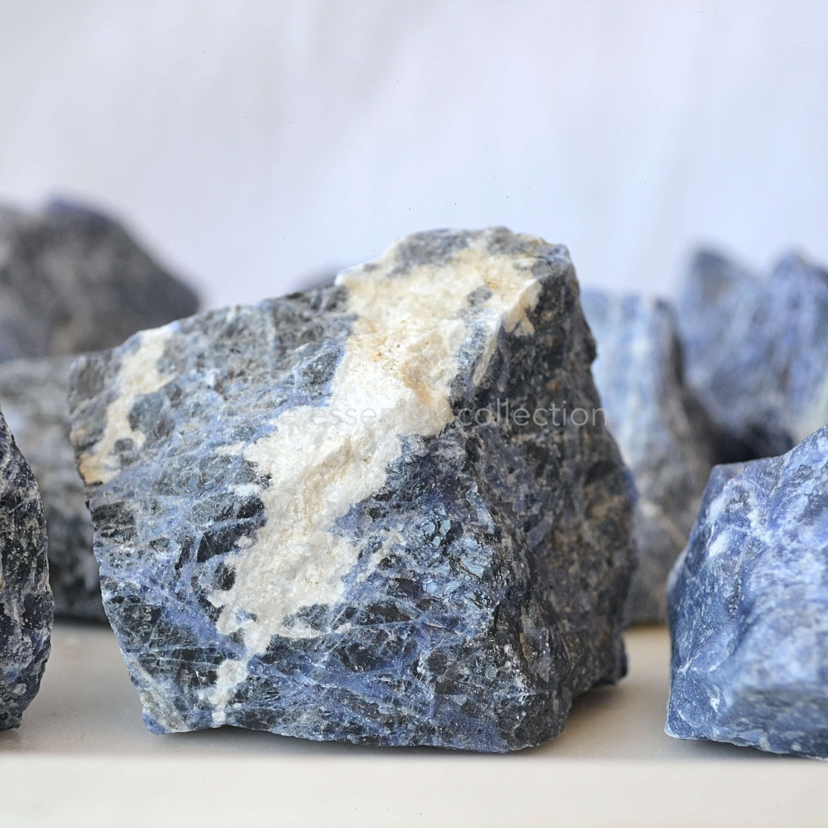 large rough raw sodalite crystal with white vein 