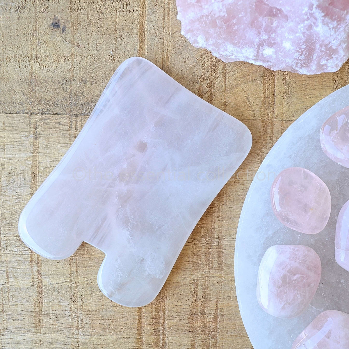 N shaped rose quartz Gua Sha crystals facial beauty tool sold by The Essential Collection Australia