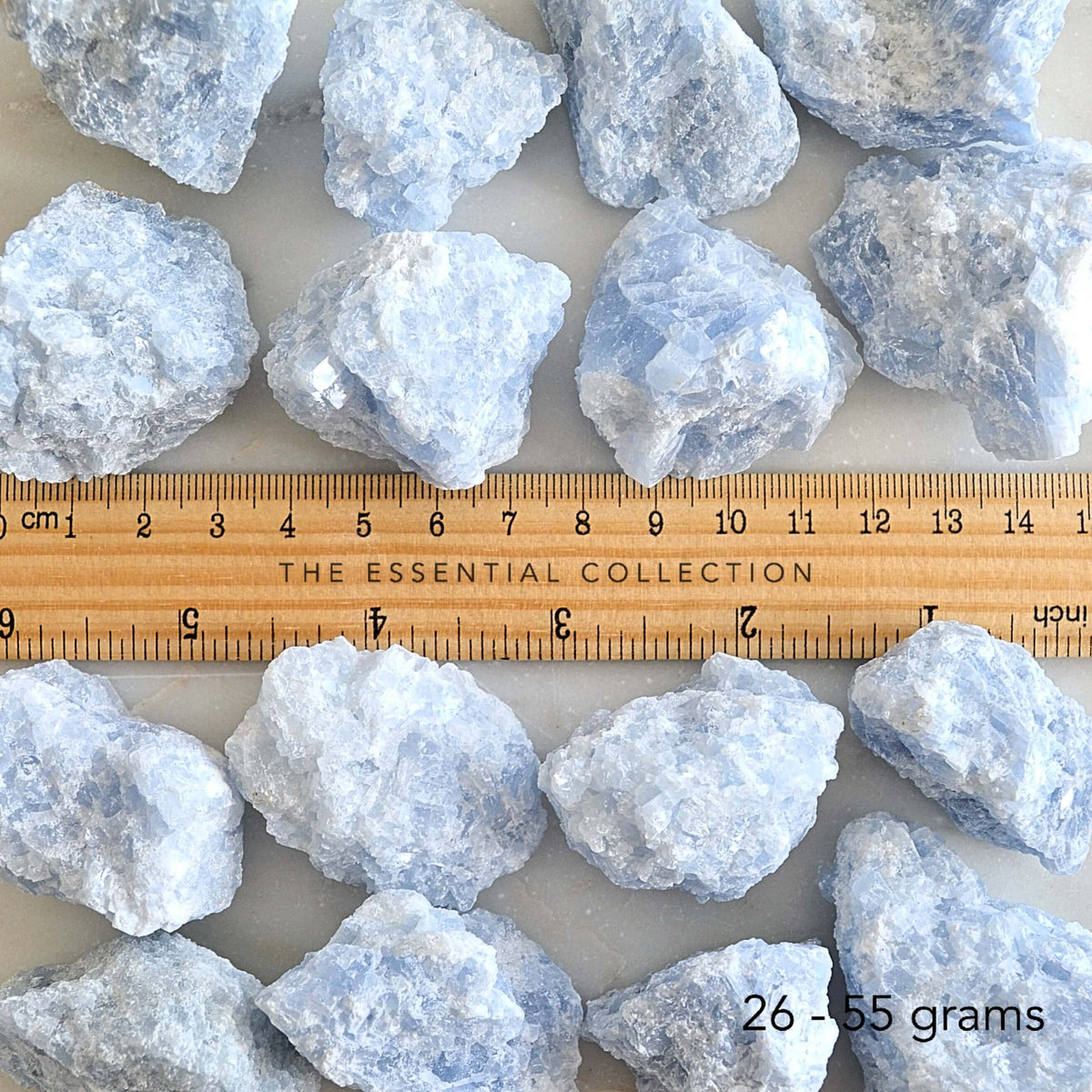 large rough raw blue calcite with ruler showing size