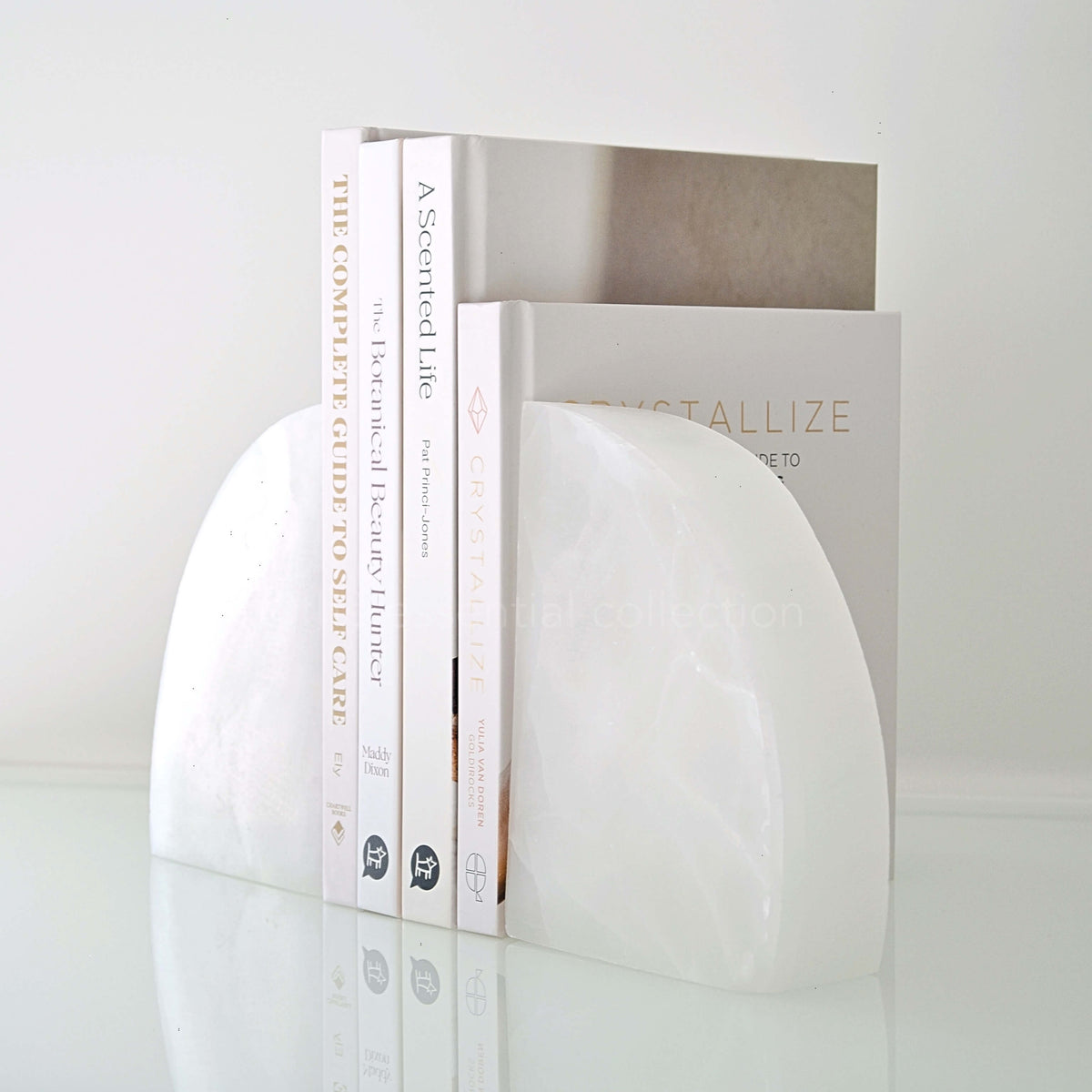 white selenite bookends with neutral coloured books